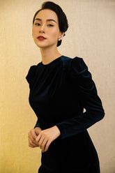 Velvet midi dress with gathered shoulders and sleek tailored fit for formal occasions